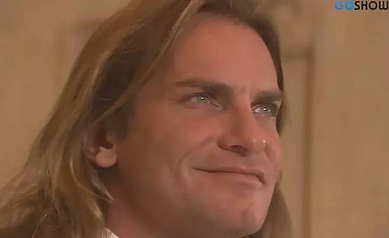 LongHaired Stud Thrusts His Cock Down Her Mouth